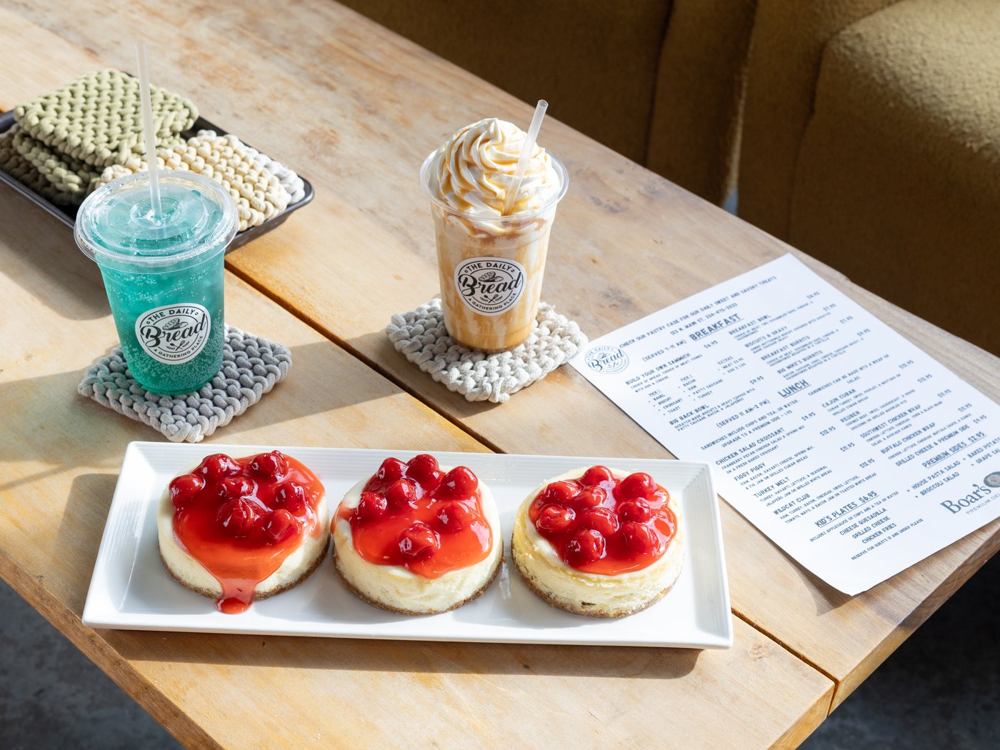 Iced drinks and cherry cheesecakes at The Daily Bread cafe in Enterprise, Alabama, photographed for social media content